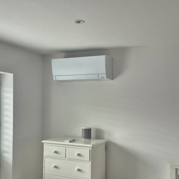 Mitsubishi air conditioning wall unit installed in a bedroom in Marple, Stockport