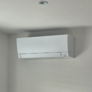 Mitsubishi air conditioning wall unit installed in a bedroom in Marple, Stockport